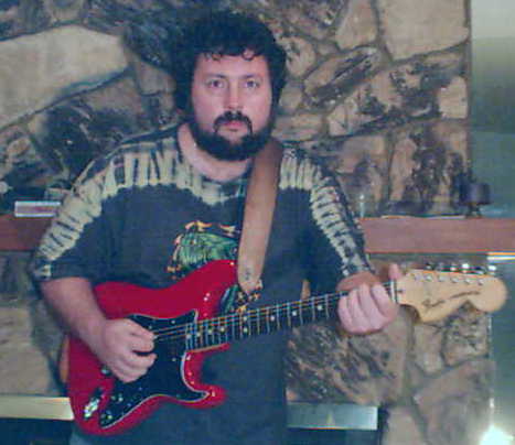 Big Bad Bombastic Bob Frazier and his bright red axe, ca 2000